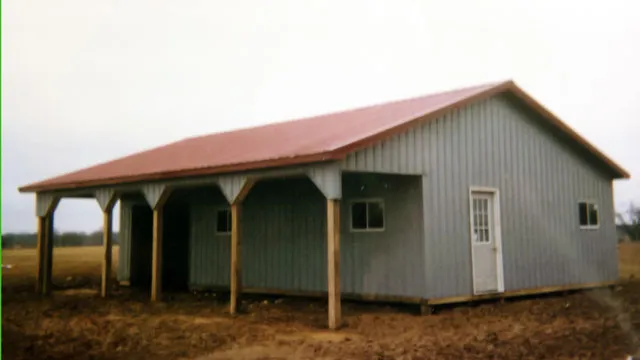 Cream building with a red roof and a cantilever porch on timber posts