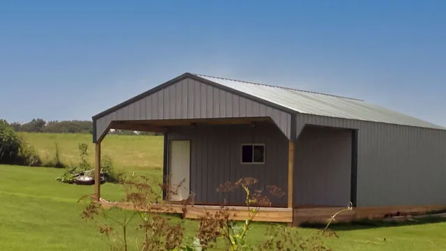 Gray building with a gable porch carried on timber posts