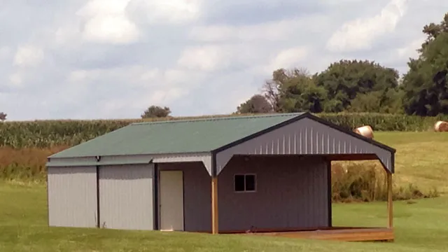 Cream and maroon building with a green roof and a gable porch
