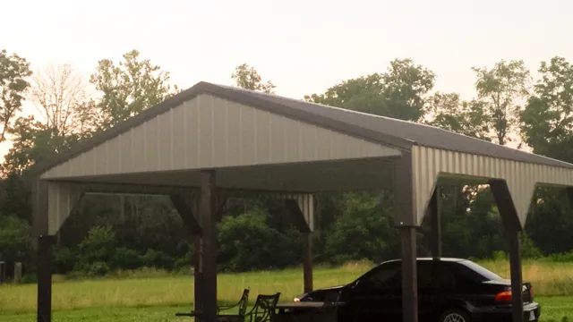 Open shelter house on posts with a gray roof