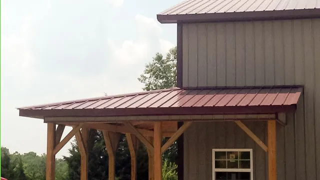 Timber porch framing under a maroon roof against brown siding