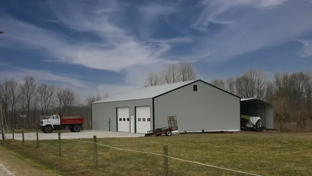 White shop with an attached lean-to, two walk doors, and a truck and trailer parked outside
