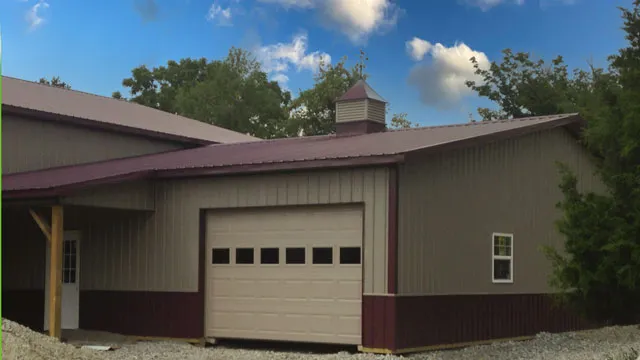 Tan building with a maroon roof and wainscot, timber porch posts, a glazed overhead door and a cupola